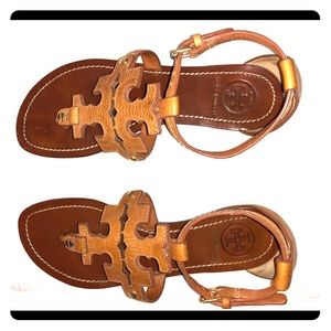 Tory Burch Pebbled Leather ankle strap.